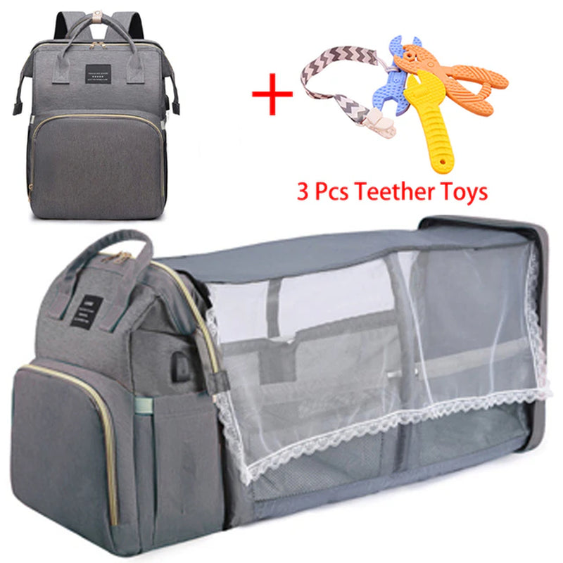 Diaper Bag with portable changing table/bassinet